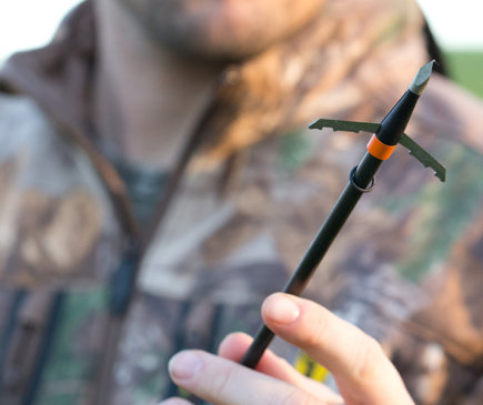 Man holding arrow with Wasp Broadhead | How to know if you have the best broadhead